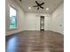 Light and airy bedroom features wood-look floors and wardrobe closet at 222 Brevard St, Statesville, NC 28677
