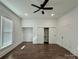 Spacious bedroom featuring wood-look floors and a ceiling fan at 222 Brevard St, Statesville, NC 28677