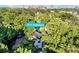 An aerial view of the home nestled among lush trees, close to the city at 2224 Highland St, Charlotte, NC 28208