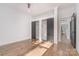 Bright bedroom with sliding closet doors and hardwood floors at 2224 Highland St, Charlotte, NC 28208