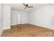 Empty bedroom with recessed lighting, hardwood floors, and a closet area at 2224 Highland St, Charlotte, NC 28208
