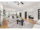 Spacious living room with open layout, hardwood floors, and modern furnishings at 2224 Highland St, Charlotte, NC 28208