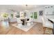 An open living space includes the dining room, living room, and kitchen at 2224 Highland St, Charlotte, NC 28208