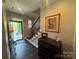 Lovely entryway featuring hardwood floors, stairs, and ample natural light from front door at 2279 Eversham Nw Dr, Concord, NC 28027
