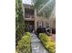 Charming two-story townhome with well-manicured landscaping and inviting covered entrance at 2279 Eversham Nw Dr, Concord, NC 28027