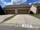 Two car garage with wide concrete driveway at 2279 Eversham Nw Dr, Concord, NC 28027
