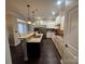 Beautiful kitchen with granite countertops, center island, and modern stainless steel appliances at 2279 Eversham Nw Dr, Concord, NC 28027