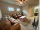 Cozy living room with comfortable seating, natural light, and a relaxing atmosphere at 2279 Eversham Nw Dr, Concord, NC 28027