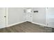 Welcoming entryway with durable hardwood flooring and convenient coat rack at 2306 W C St, Kannapolis, NC 28081