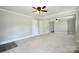Spacious living area with ample natural light, neutral walls, and modern ceiling fan at 2306 W C St, Kannapolis, NC 28081
