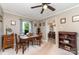 Cozy dining room featuring wood furnishings, natural light, and neutral walls at 2718 Ridgewood Ln, Rock Hill, SC 29730