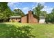 Spacious backyard with mature trees and a well-maintained lawn at 2718 Ridgewood Ln, Rock Hill, SC 29730