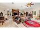 Open-concept living room with ceiling fans, multiple seating areas, and easy access to other rooms at 2718 Ridgewood Ln, Rock Hill, SC 29730