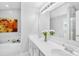 This bathroom is bright and fresh, and features dual sinks and a separate shower and tub at 3006 Emerald Meadow Ln, Charlotte, NC 28273