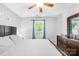 The bedroom features a double window, and a large dresser at 3006 Emerald Meadow Ln, Charlotte, NC 28273