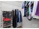 The walk-in closet features white wire shelving and lots of room for clothes and storage at 3006 Emerald Meadow Ln, Charlotte, NC 28273