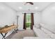 Cozy living room with a white sofa, natural light, and neutral color palette at 3006 Emerald Meadow Ln, Charlotte, NC 28273