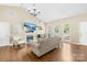 Inviting living room with vaulted ceiling, fireplace, and hardwood floors at 3006 Emerald Meadow Ln, Charlotte, NC 28273
