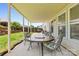 Relaxing outdoor patio with covered area and seating, perfect for entertaining and dining al fresco at 312 Farm Springs Dr, Mount Holly, NC 28120