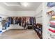Walk-in closet with ample hanging space, shelving, and neutral carpet at 312 Farm Springs Dr, Mount Holly, NC 28120