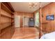 Bedroom with hardwood floors, a blue dresser and ample closet space at 321 W Bank St, Salisbury, NC 28144