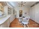 Charming breakfast nook with storage and white chairs at 321 W Bank St, Salisbury, NC 28144