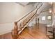 Elegant entryway featuring hardwood floors and a gorgeous staircase at 321 W Bank St, Salisbury, NC 28144