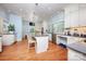 Spacious kitchen featuring a large island, modern appliances, and lots of natural light at 321 W Bank St, Salisbury, NC 28144