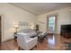 Open-concept living room featuring hardwood floors and comfortable seating at 321 W Bank St, Salisbury, NC 28144