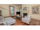 Cozy living room with a fireplace, hardwood floors, and neutral furniture at 321 W Bank St, Salisbury, NC 28144