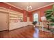 Charming office featuring built-in shelving, and hardwood flooring at 321 W Bank St, Salisbury, NC 28144