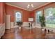 Spacious office with hardwood floors, large windows and charming paint at 321 W Bank St, Salisbury, NC 28144