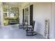 Inviting front porch with rocking chairs and a charming porch swing at 321 W Bank St, Salisbury, NC 28144