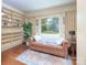 Sitting room with built-in bookshelves, hardwood floors, and large window at 321 W Bank St, Salisbury, NC 28144