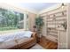 Sitting area with a view, built-in bookshelves, and hardwood floors at 321 W Bank St, Salisbury, NC 28144