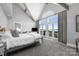 Airy bedroom with vaulted ceilings, a private balcony, and stunning lake views at 3386 Governors Island Dr, Denver, NC 28037