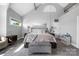 Comfortable bedroom with soft lighting, a decorative headboard, and neutral decor at 3386 Governors Island Dr, Denver, NC 28037