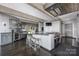 Bright, modern kitchen with island, bar, and stainless steel appliances at 3386 Governors Island Dr, Denver, NC 28037