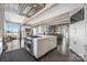 Contemporary kitchen featuring a large island, state-of-the-art appliances, and sleek cabinetry at 3386 Governors Island Dr, Denver, NC 28037