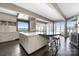 Spacious kitchen with island, breakfast bar, and stainless steel appliances overlooking the lake at 3386 Governors Island Dr, Denver, NC 28037