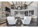 Open-concept living room featuring stone fireplace, and second story loft area at 3386 Governors Island Dr, Denver, NC 28037