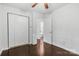 Bedroom with hardwood floors, closet, and doorway to bathroom at 370 Old Camden Rd, Lancaster, SC 29720