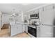 Updated kitchen with stainless steel appliances, modern cabinetry, and tile backsplash at 370 Old Camden Rd, Lancaster, SC 29720