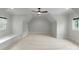 Unfurnished bedroom featuring neutral carpet, a dormer window, vaulted ceilings and recessed lighting at 3815 Stoney Ridge Trl, Charlotte, NC 28210