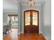 Inviting foyer showcasing a decorative stained glass front door at 3815 Stoney Ridge Trl, Charlotte, NC 28210