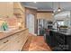 Bright kitchen showcasing custom cabinets, stainless steel appliances, and a large island with copper sink at 3815 Stoney Ridge Trl, Charlotte, NC 28210