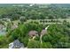 Aerial view of large, secluded property in wooded neighborhood, close to Weddington Schools at 405 Gladelynn Way, Waxhaw, NC 28173