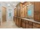 Bathroom with a vanity, a mirror, and an entrance to a shower and toilet room at 405 Gladelynn Way, Waxhaw, NC 28173