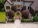 Overhead shot of courtyard featuring decorative fountain and manicured trees and gardens at 405 Gladelynn Way, Waxhaw, NC 28173