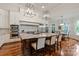 Gourmet kitchen featuring stainless steel appliances, a large island, and pendant lighting at 405 Gladelynn Way, Waxhaw, NC 28173